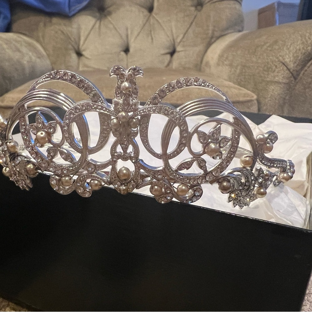 my wedding hairpiece/crown; Swarovski crystals, in perfect condition.